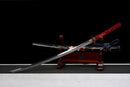 Katana Emaki — Acier T10, Poignée rouge, fourreau noir, motif guerrier, cordon bleu