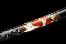 Katana Emaki — Acier T10, Poignée rouge, fourreau noir, motif guerrier, cordon bleu