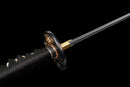 Katana Kohaku — Tamahagane, Poignée noire sur raie blanche, fourreau doré marbré, cordon noir.