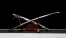 Katana Fubuki — Acier T10, Poignée ito noir et blanc, fourreau noir motif neige argenté, cordon bicolore.